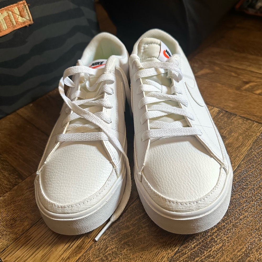Nice clean NIKES! Never worn.